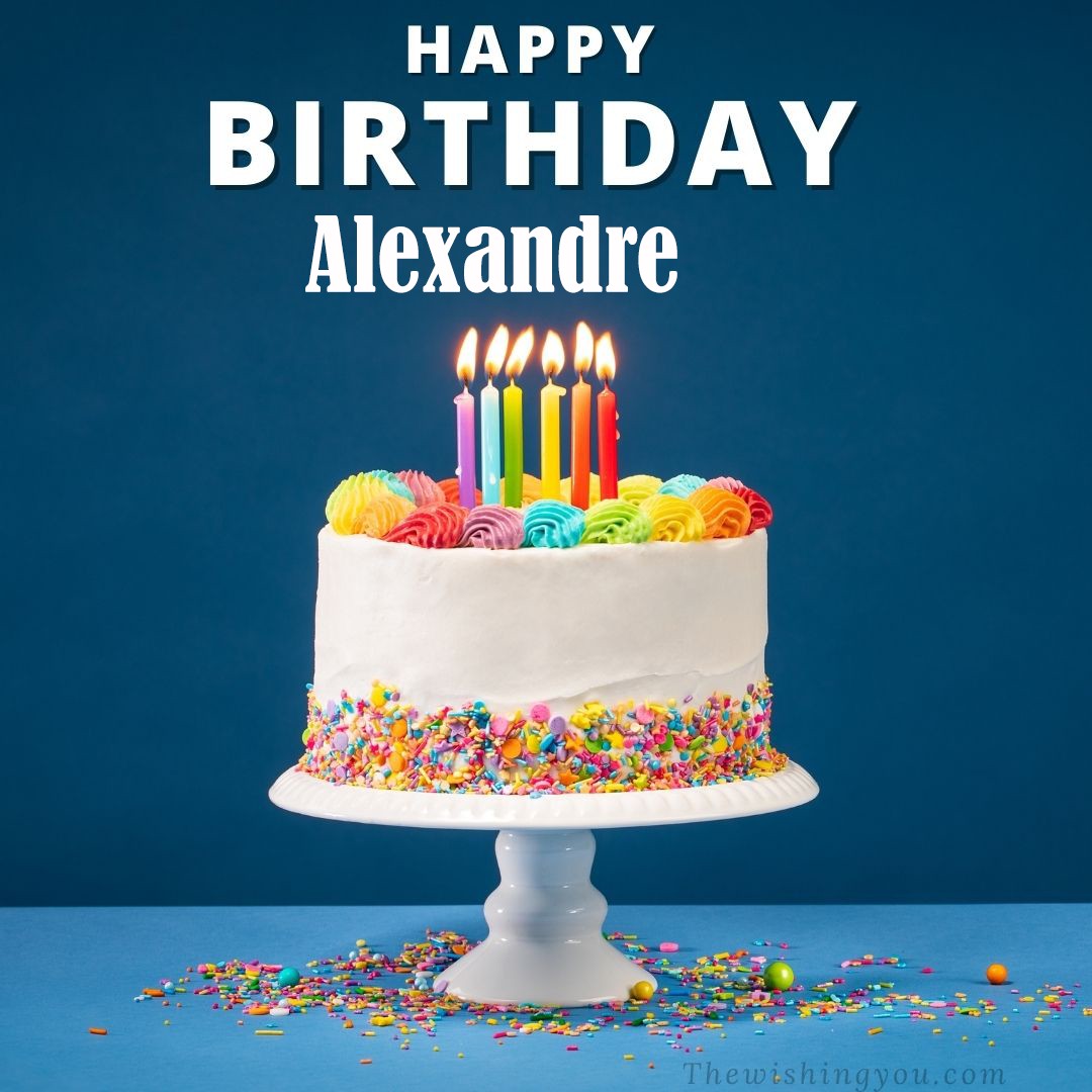 Happy birthday Alexandre written on image White cake keep on White stand and burning candles Sky background
