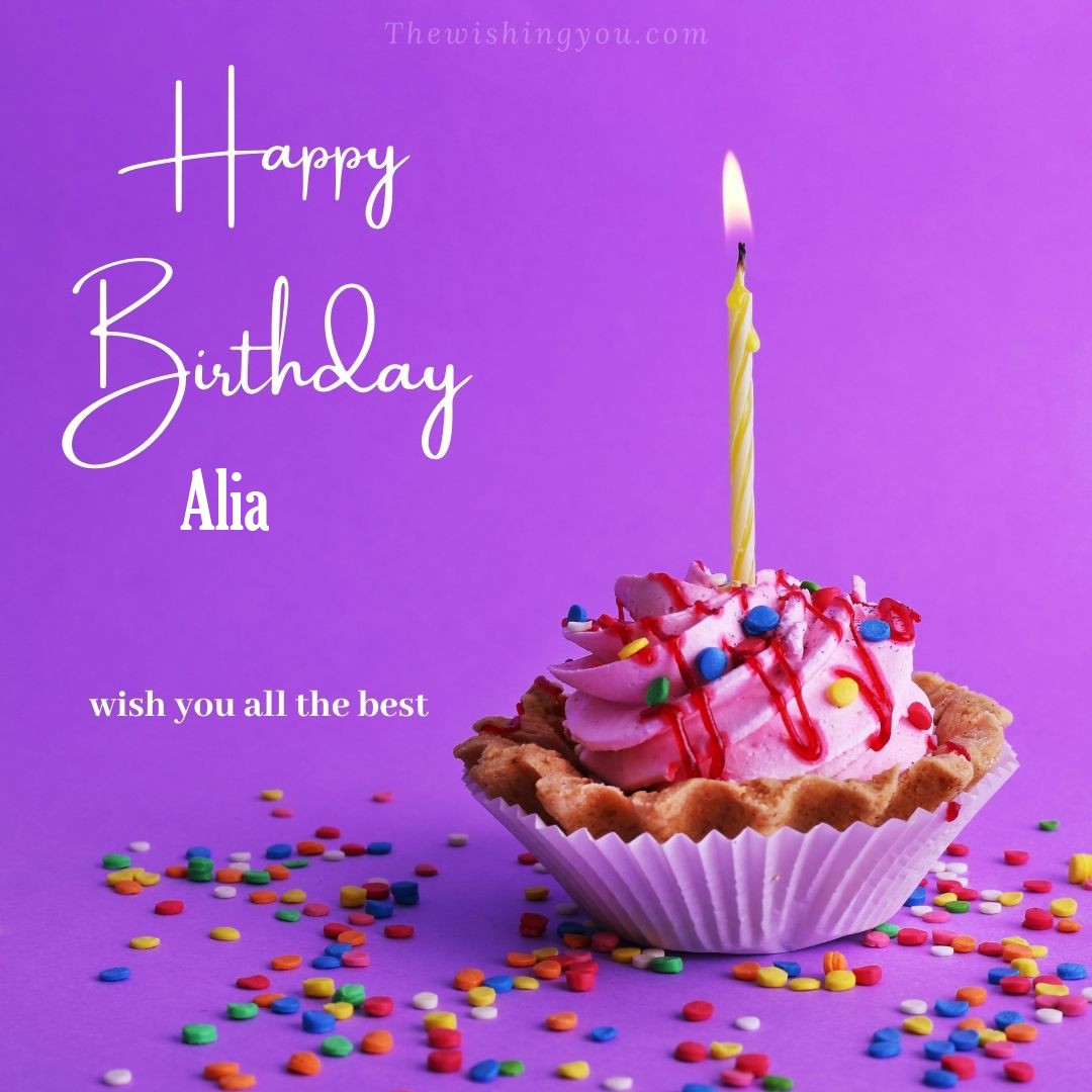 Happy birthday Alia written on image cup cake burning candle Purple background