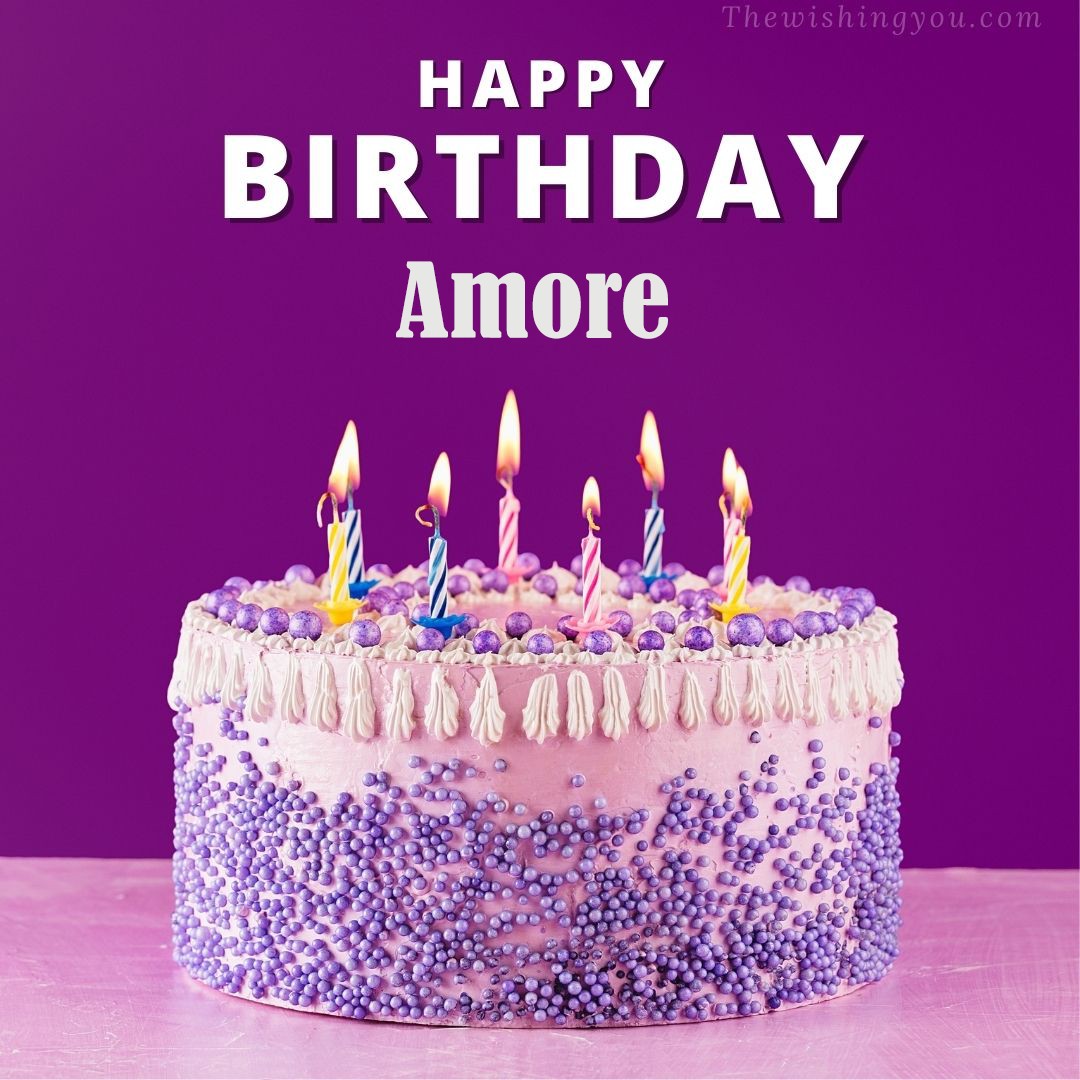 Happy birthday Amore written on image White and blue cake and burning candles Violet background
