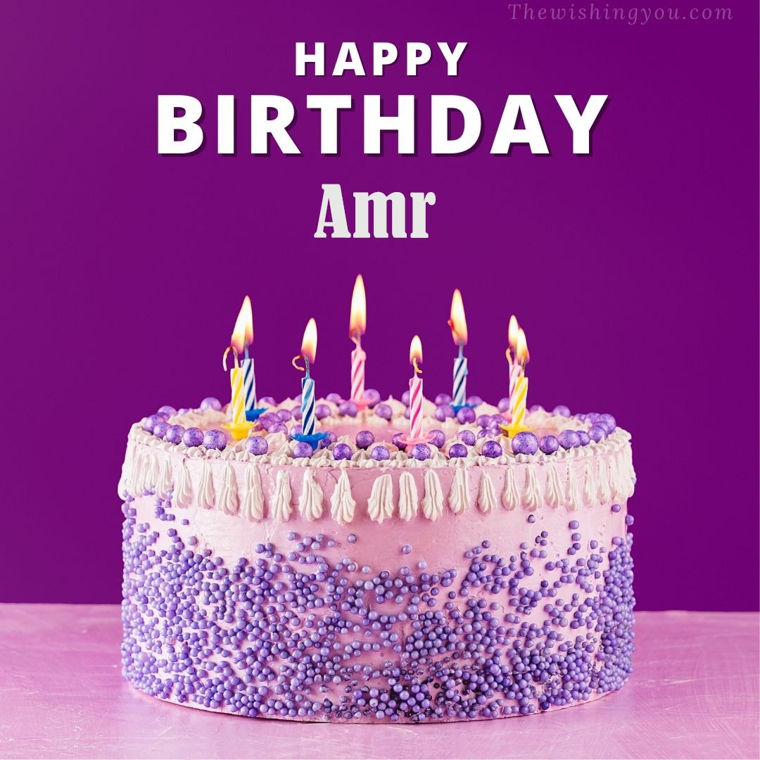 Happy birthday Amr written on image White and blue cake and burning candles Violet background