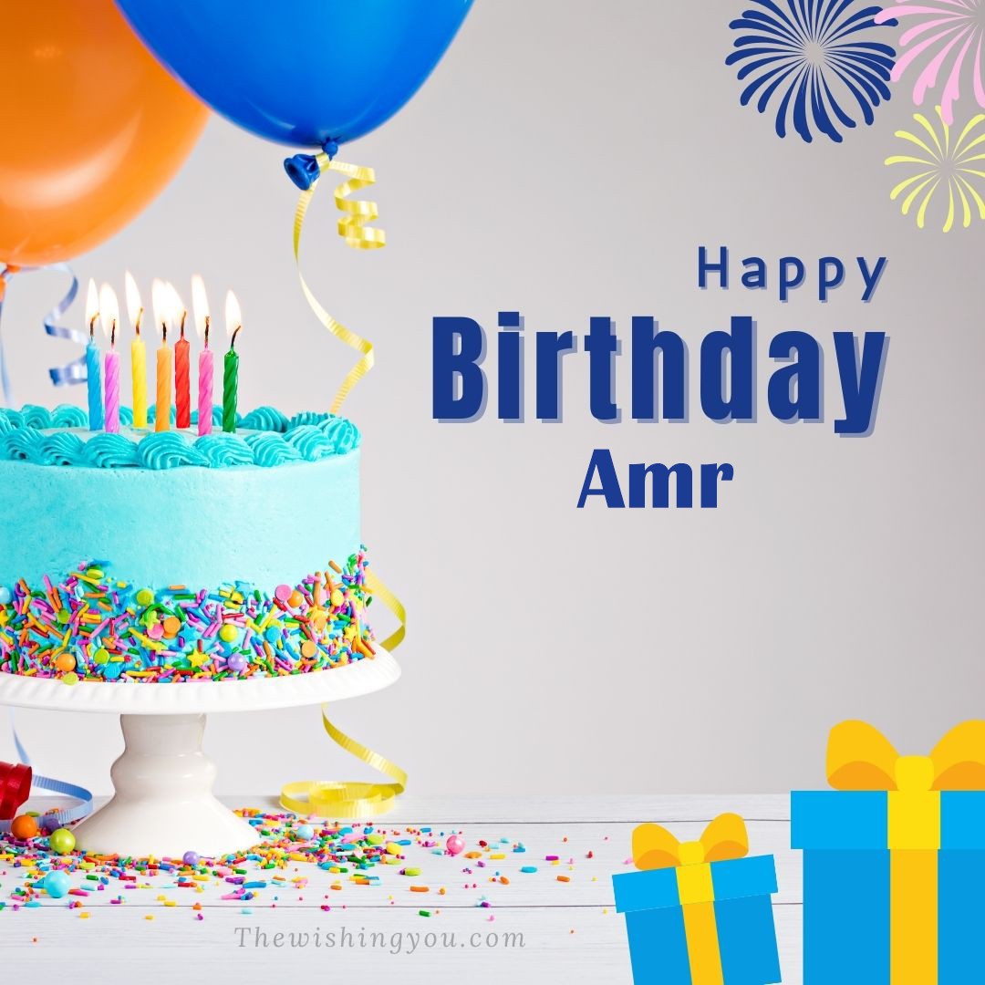 Happy birthday Amr written on image White cake keep on White stand and blue gift boxes with Yellow ribon with Sky background