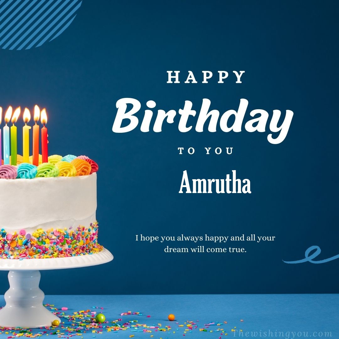 Happy birthday Amrutha written on image white cake and burning candle Blue Background