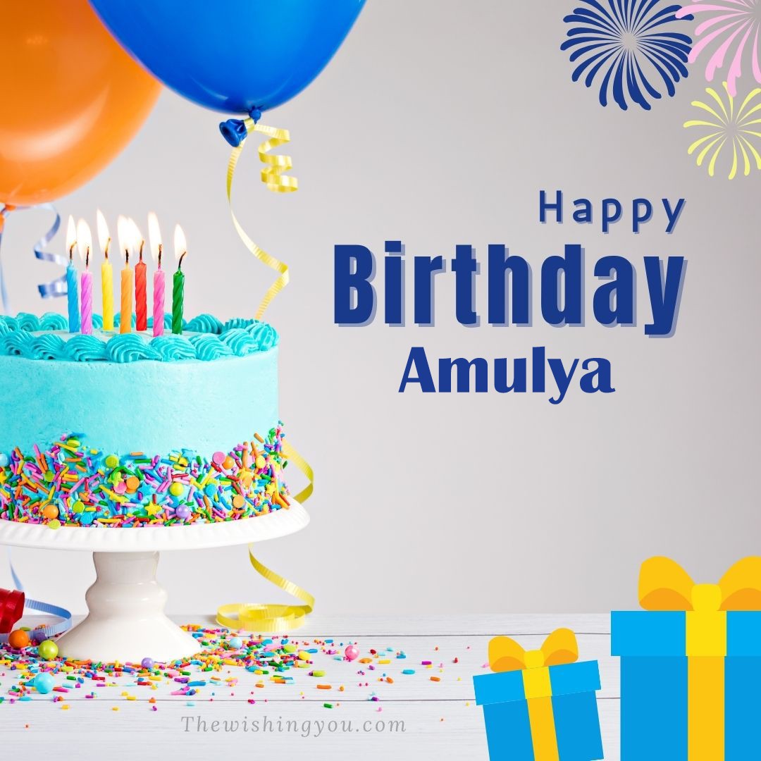 Happy birthday Amulya written on image White cake keep on White stand and blue gift boxes with Yellow ribon with Sky background