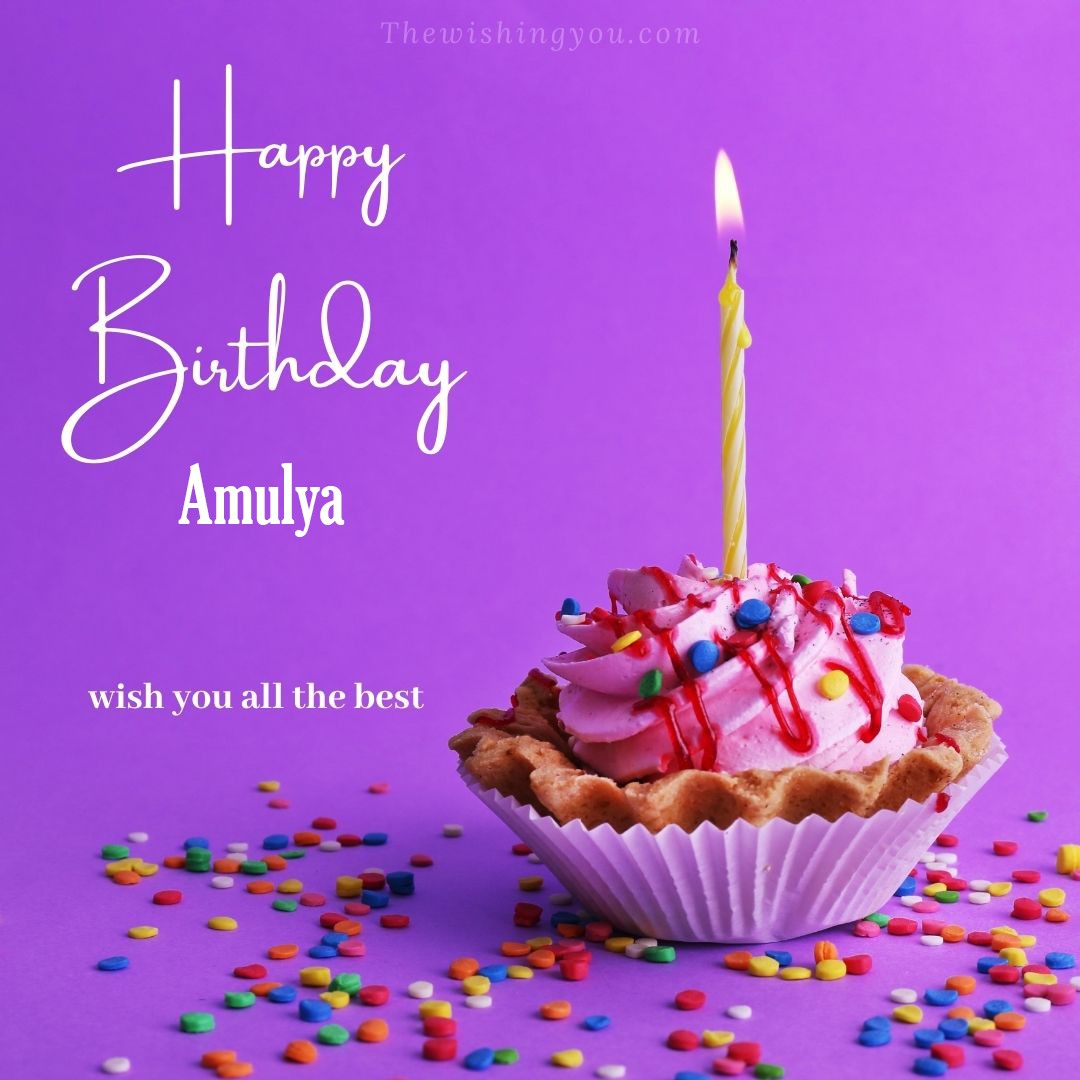 Happy birthday Amulya written on image cup cake burning candle Purple background
