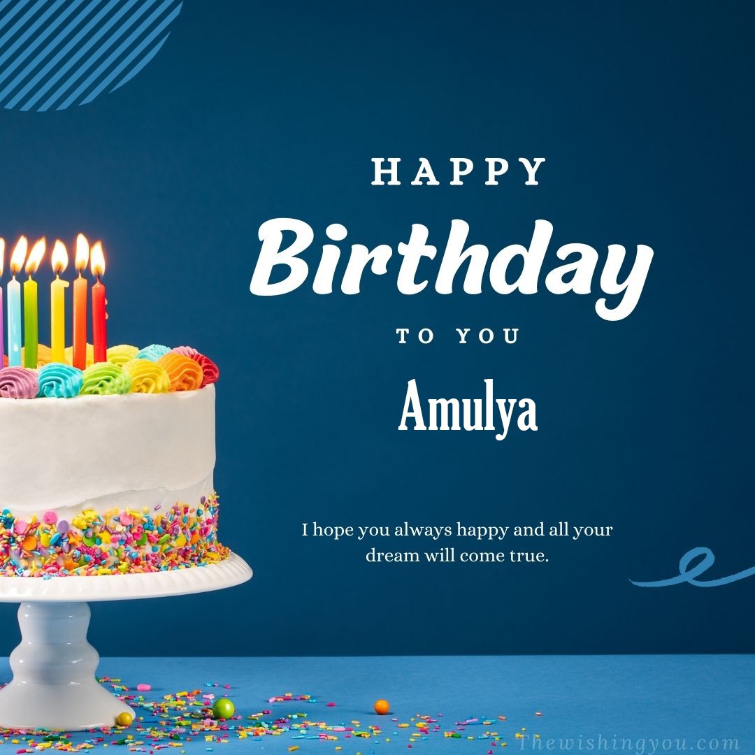 Happy birthday Amulya written on image white cake and burning candle Blue Background