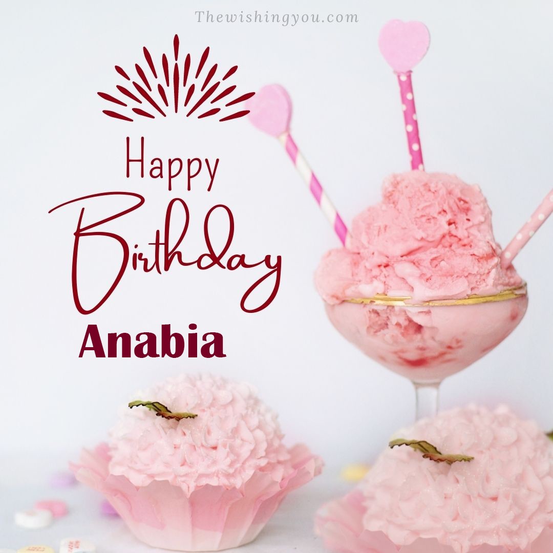 Happy birthday Anabia written on image pink cup cake and Light White background