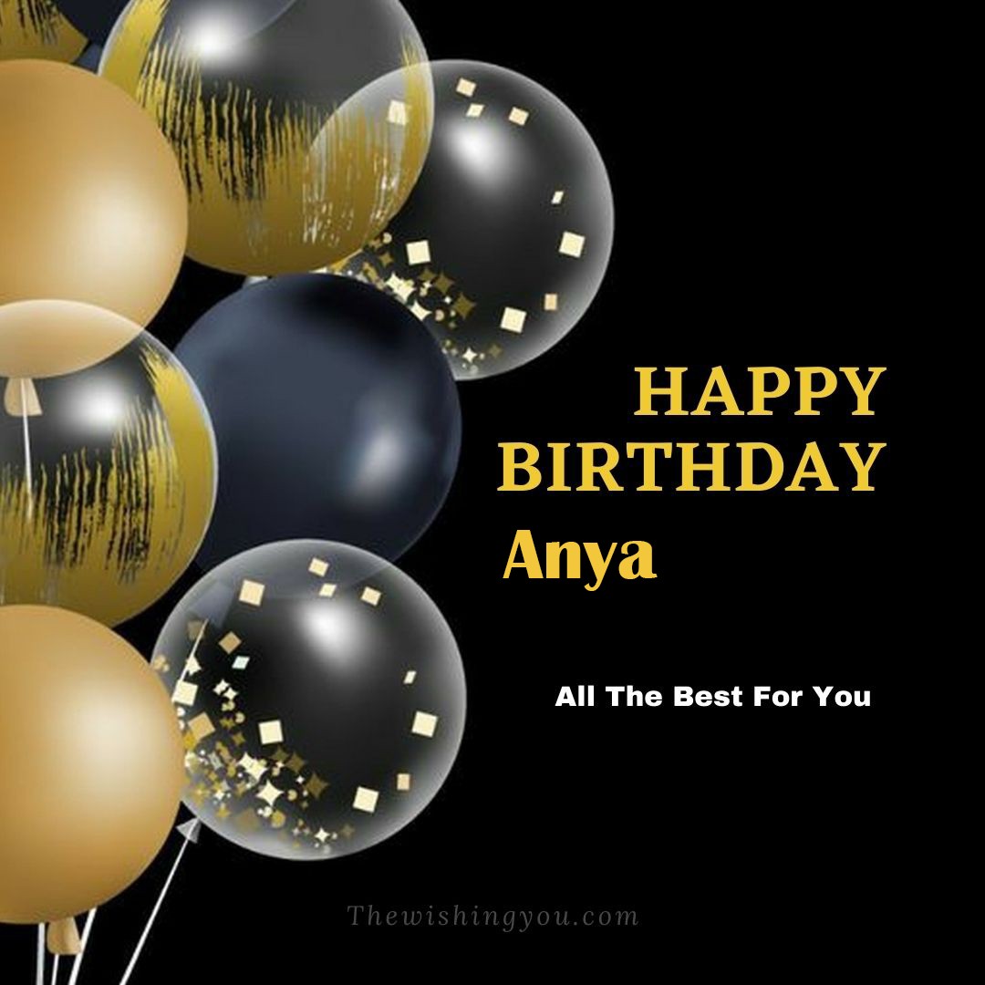 Happy birthday Anya written on image Big White Black and Yellow transparent ballonsBlack background
