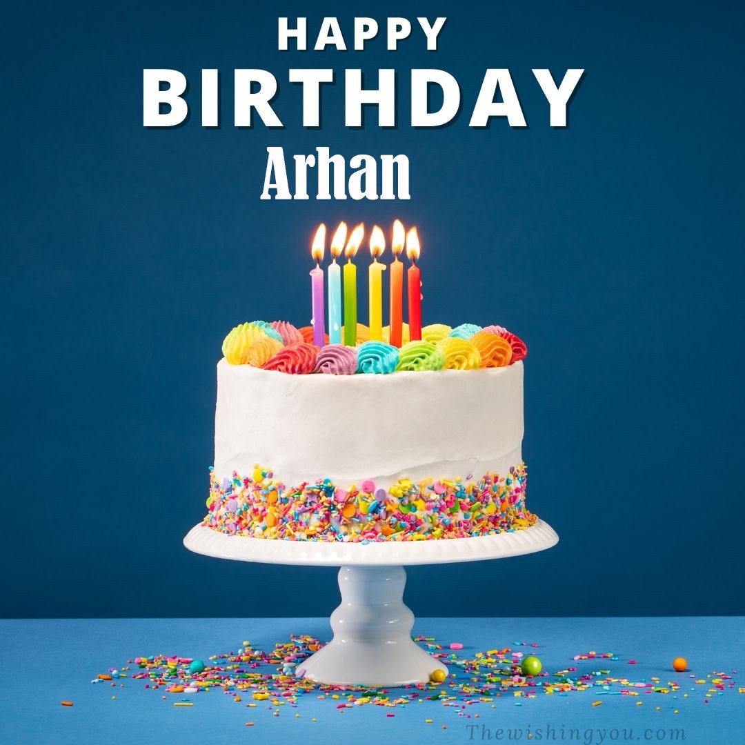 Happy birthday Arhan written on image White cake keep on White stand and burning candles Sky background
