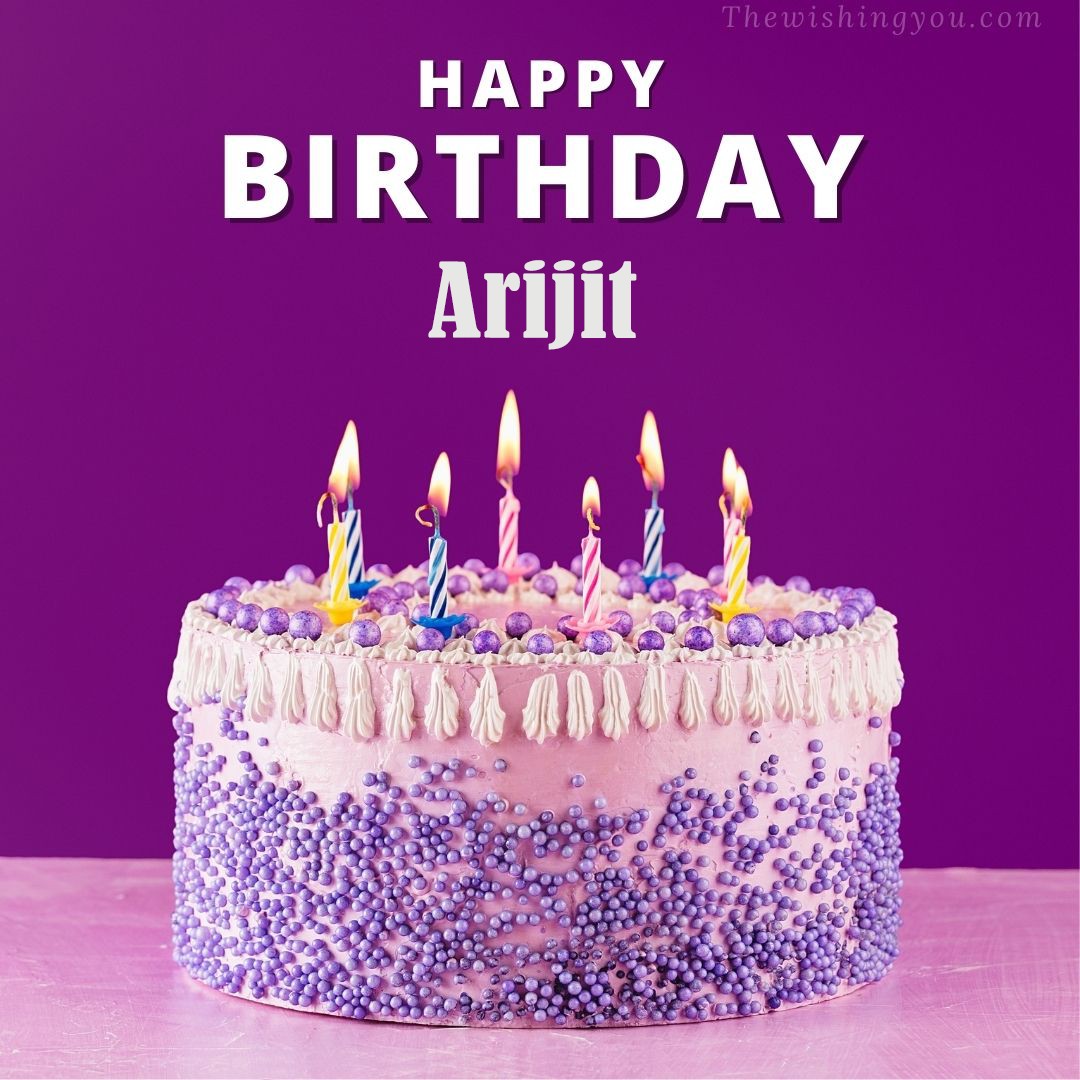 Happy birthday Arijit written on image White and blue cake and burning candles Violet background
