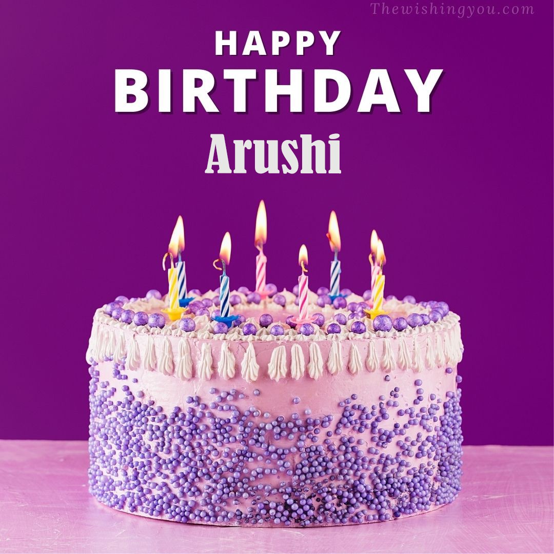 Happy birthday Arushi written on image White and blue cake and burning candles Violet background