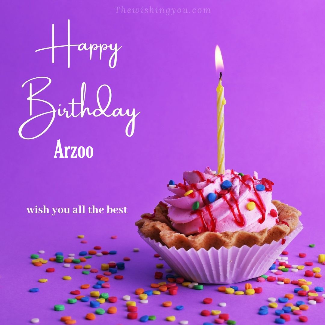 Happy birthday Arzoo written on image cup cake burning candle Purple background
