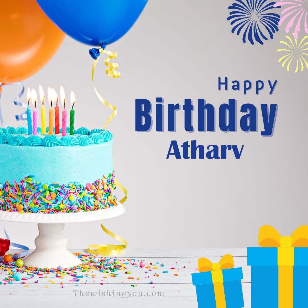 Happy birthday Atharv written on image White cake keep on White stand and blue gift boxes with Yellow ribon with Sky background