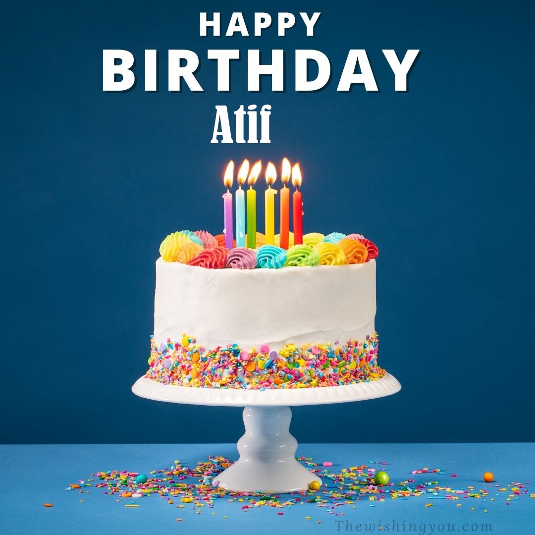Happy birthday Atif written on image White cake keep on White stand and burning candles Sky background