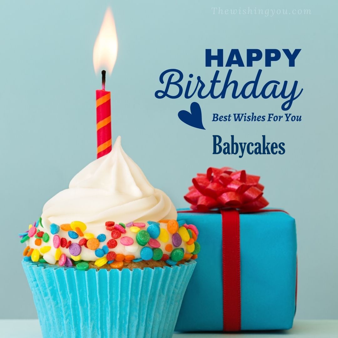 Happy birthday Babycakes written on image Blue Cup cake and burning candle blue Gift boxes with red ribon