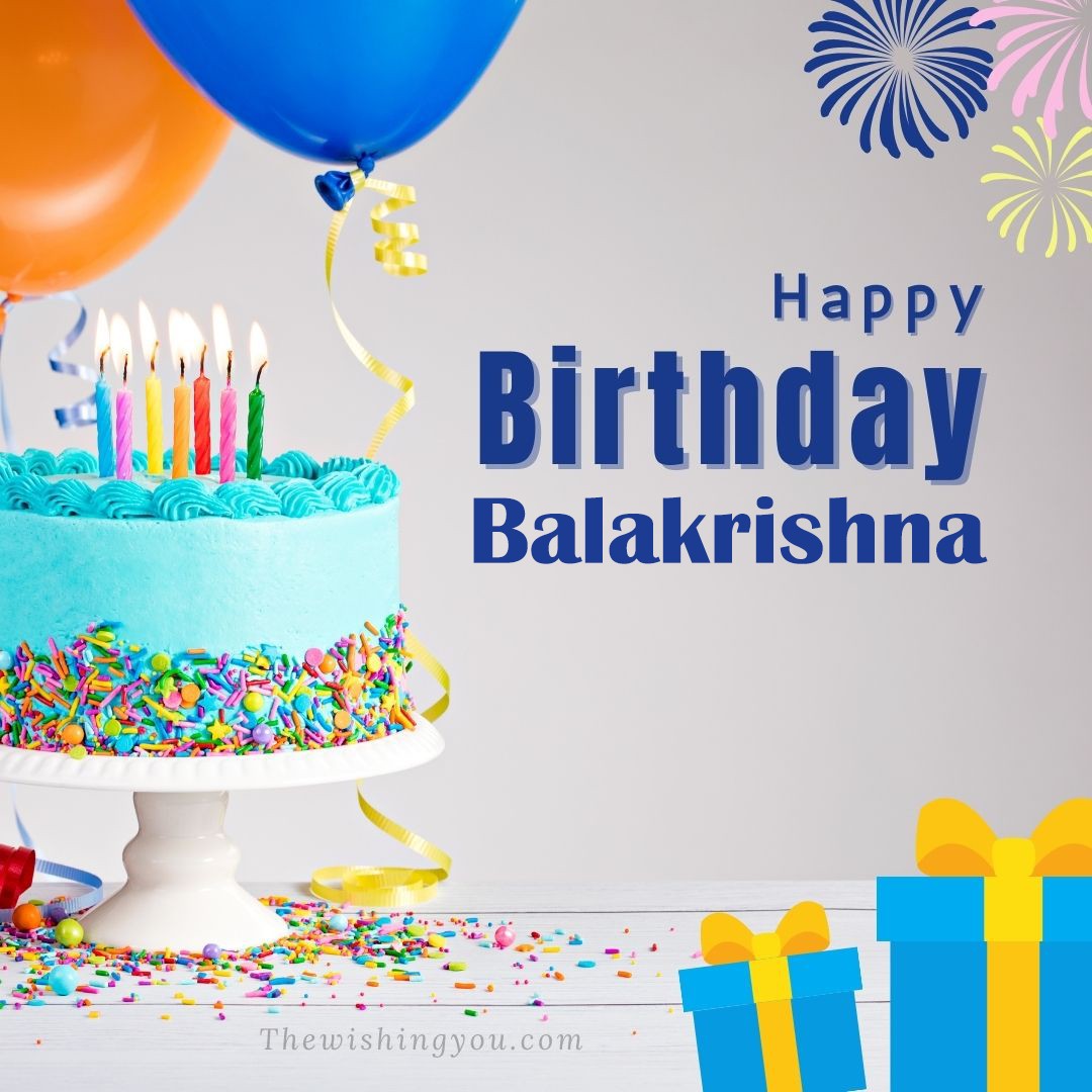 Happy birthday Balakrishna written on image White cake keep on White stand and blue gift boxes with Yellow ribon with Sky background