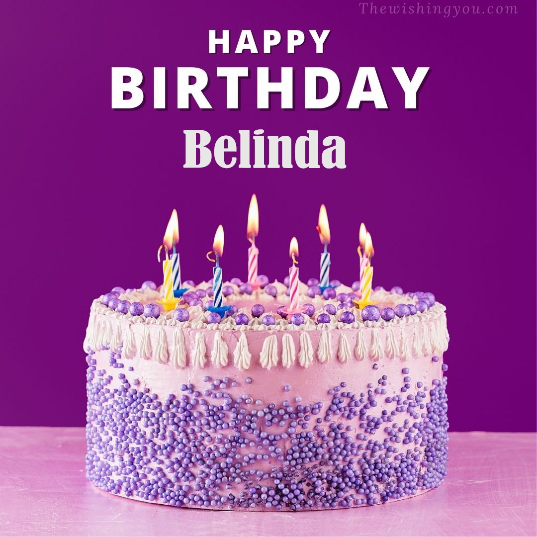 Happy birthday Belinda written on image White and blue cake and burning candles Violet background