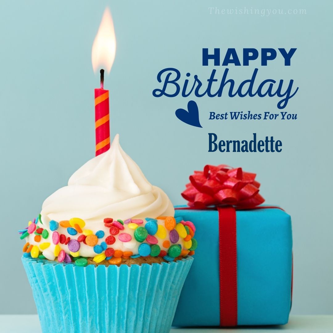 Happy birthday Bernadette written on image Blue Cup cake and burning candle blue Gift boxes with red ribon