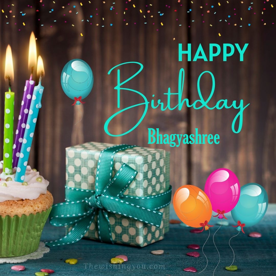 Happy birthday Bhagyashree written on image Green Cup cake and burning candlepink blue and yello balloons Gift boxes