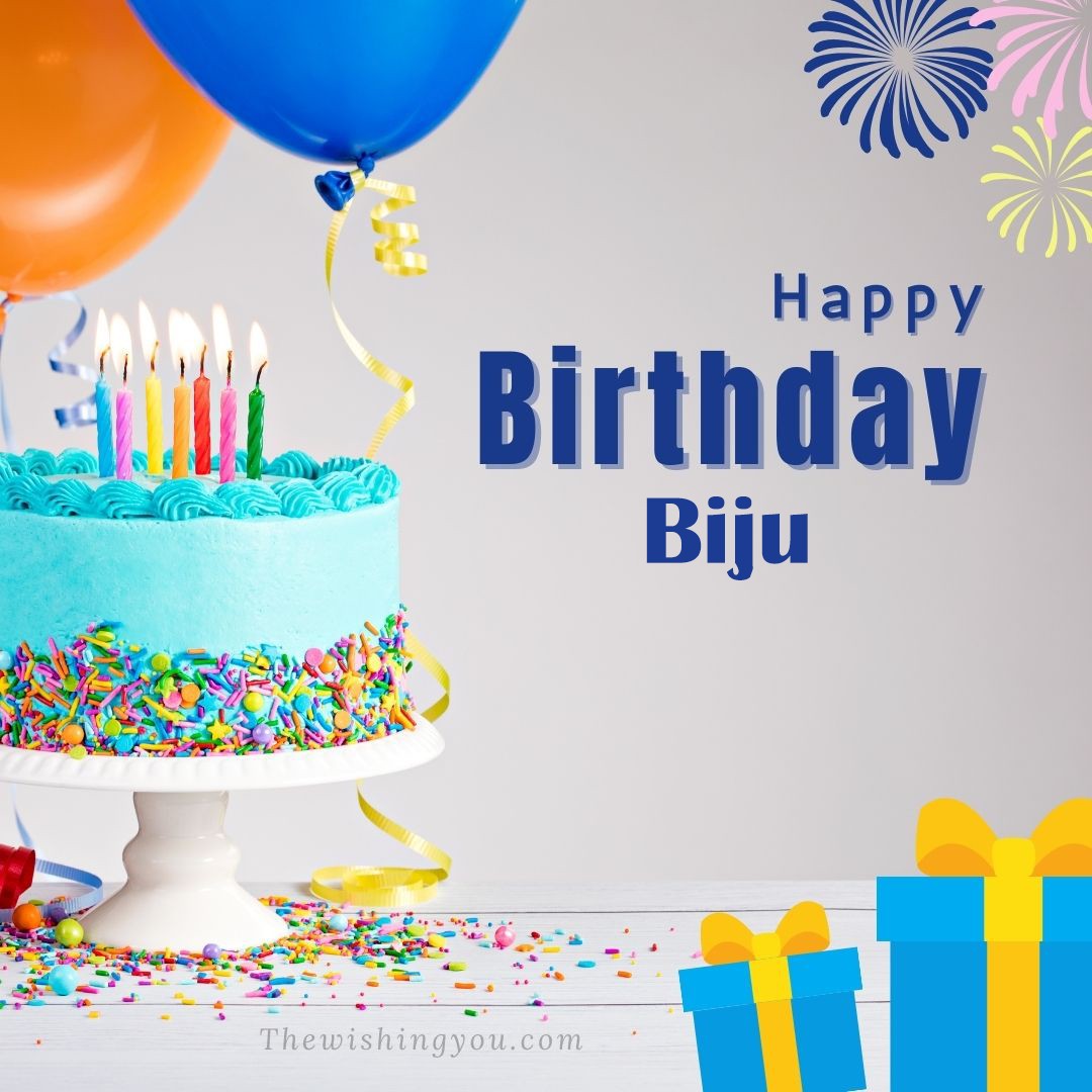 Happy birthday Biju written on image White cake keep on White stand and blue gift boxes with Yellow ribon with Sky background