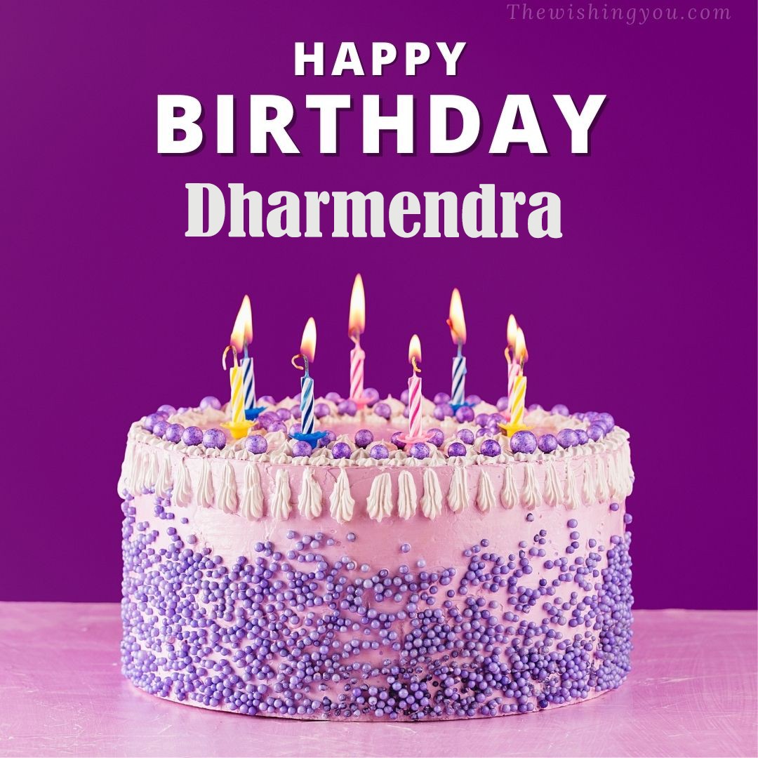 Happy birthday Dharmendra written on image White and blue cake and burning candles Violet background