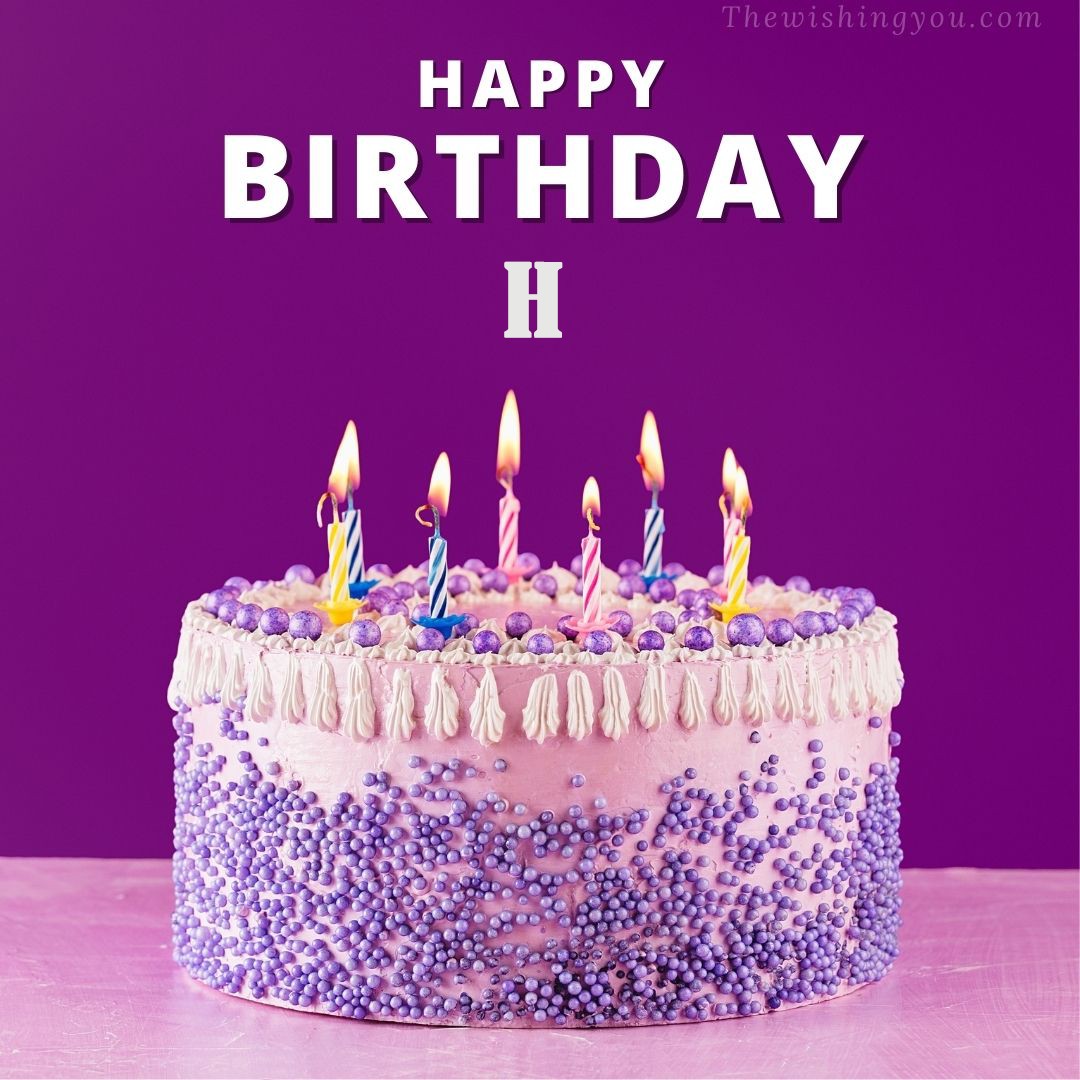Happy birthday H written on image White and blue cake and burning candles Violet background