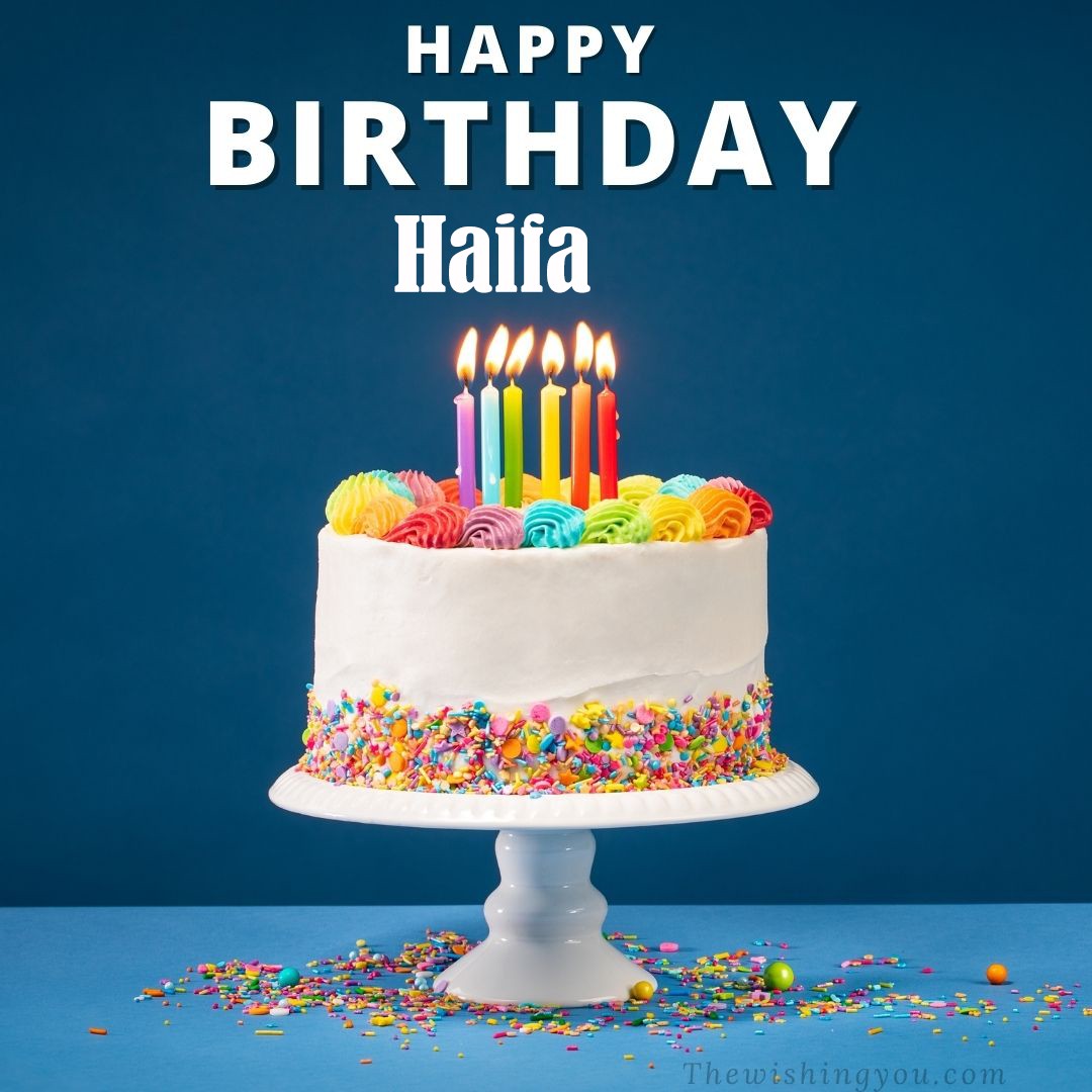 Happy birthday Haifa written on image White cake keep on White stand and burning candles Sky background