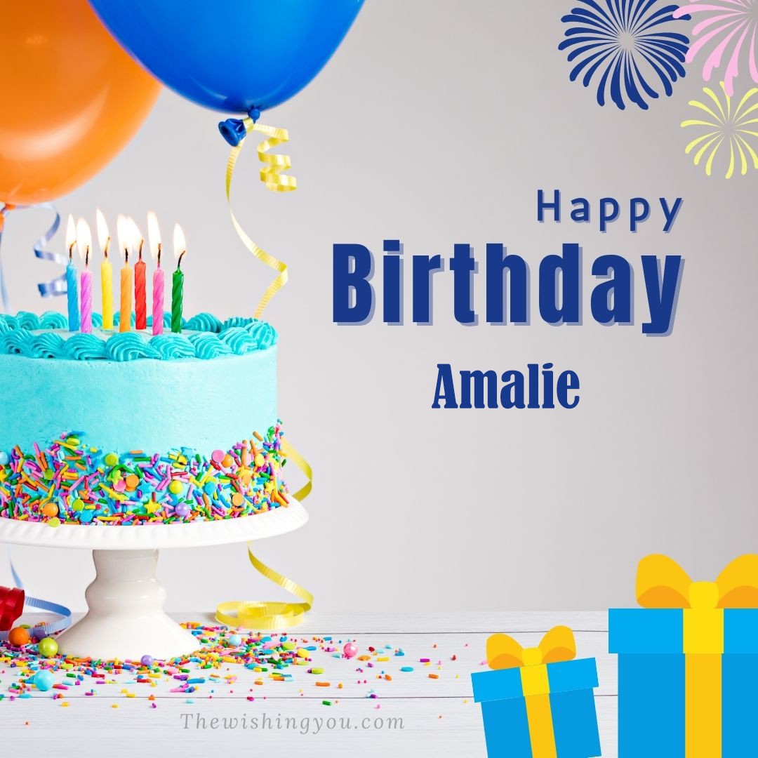 Happy Birthday Amalie written on image Green cake keep on White stand and blue gift boxes with Yellow ribon with Sky background
