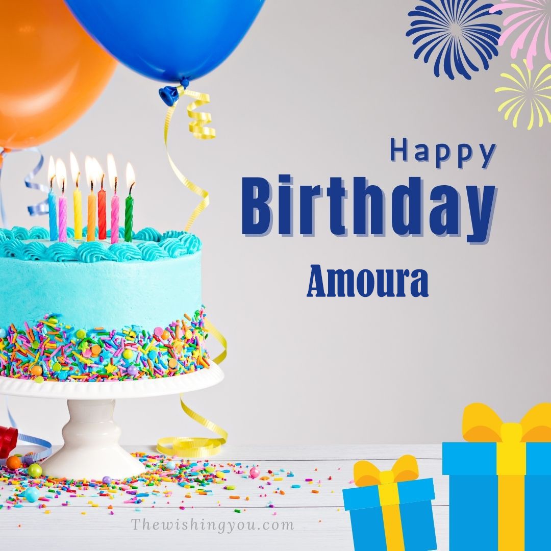 Happy Birthday Amoura written on image Green cake keep on White stand and blue gift boxes with Yellow ribon with Sky background