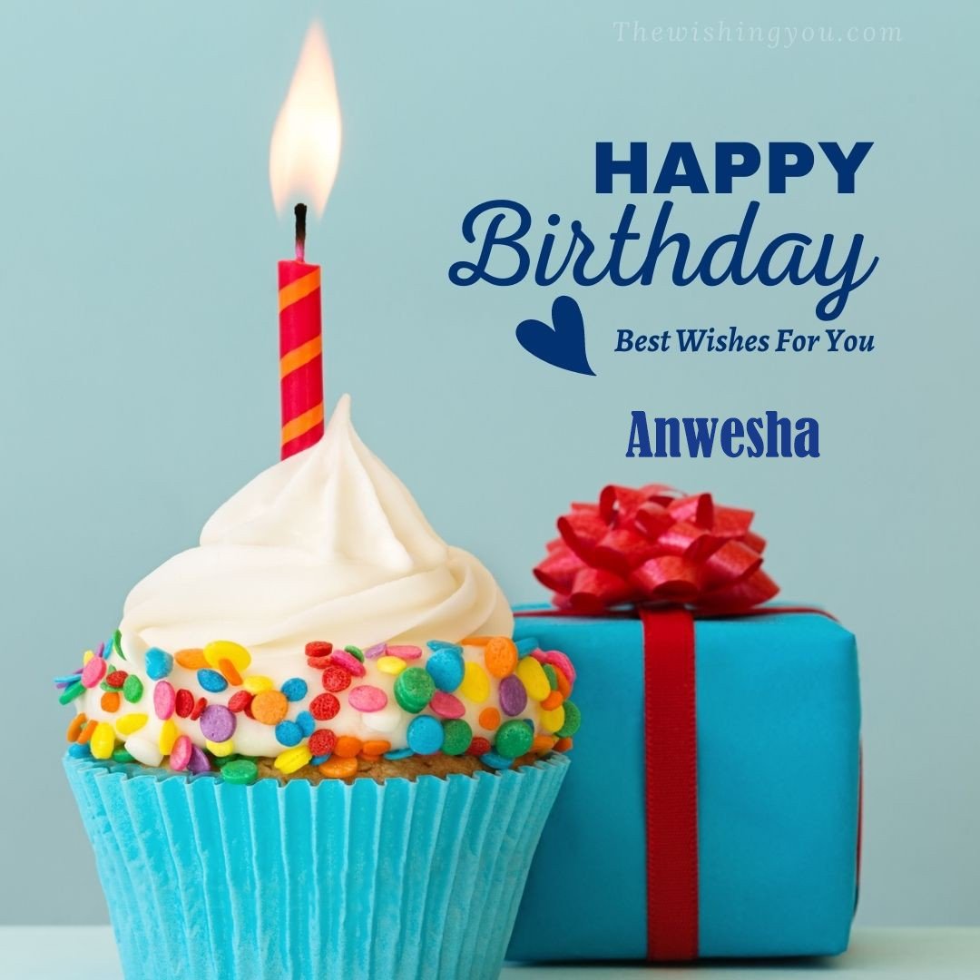 Happy Birthday Anwesha written on image Blue Cup cake and burning candle blue Gift boxes with red ribon