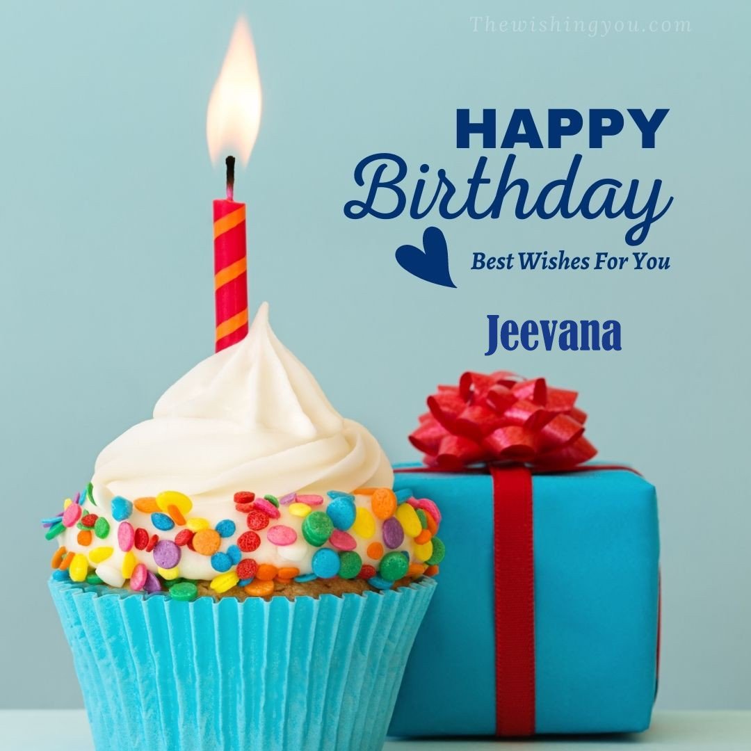 Happy Birthday Jeevana written on image Blue Cup cake and burning candle blue Gift boxes with red ribon