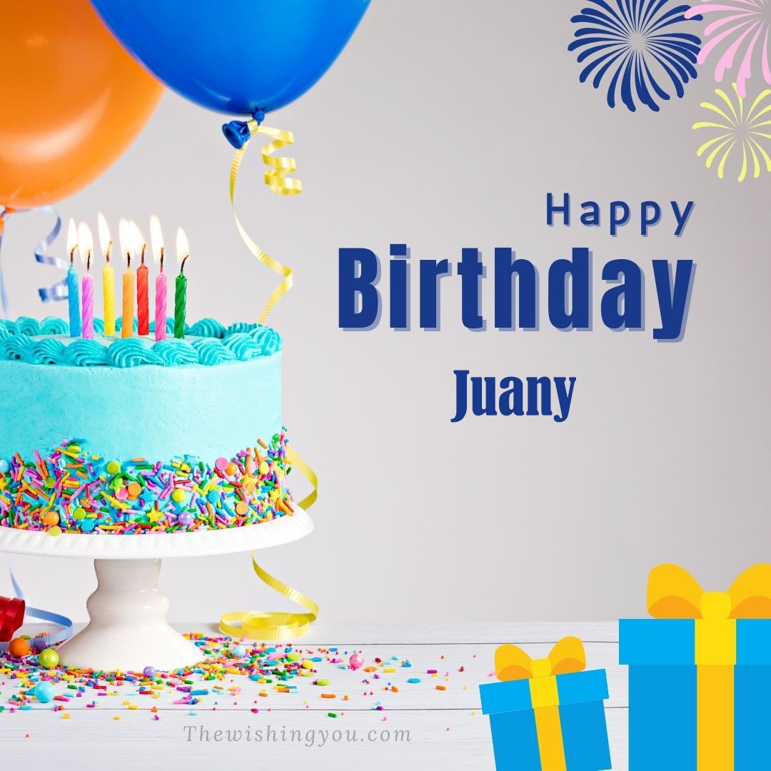 Happy Birthday Juany written on image Green cake keep on White stand and blue gift boxes with Yellow ribon with Sky background