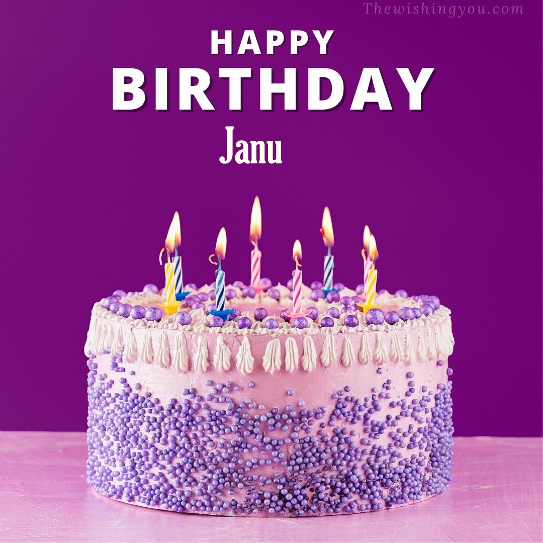 Happy birthday Janu written on image White and blue cake and burning candles Violet background