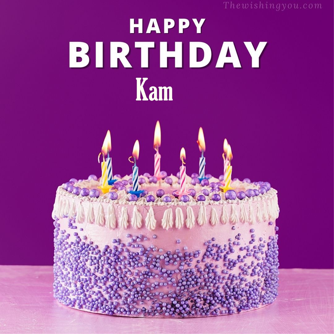 Happy birthday Kam written on image White and blue cake and burning candles Violet background