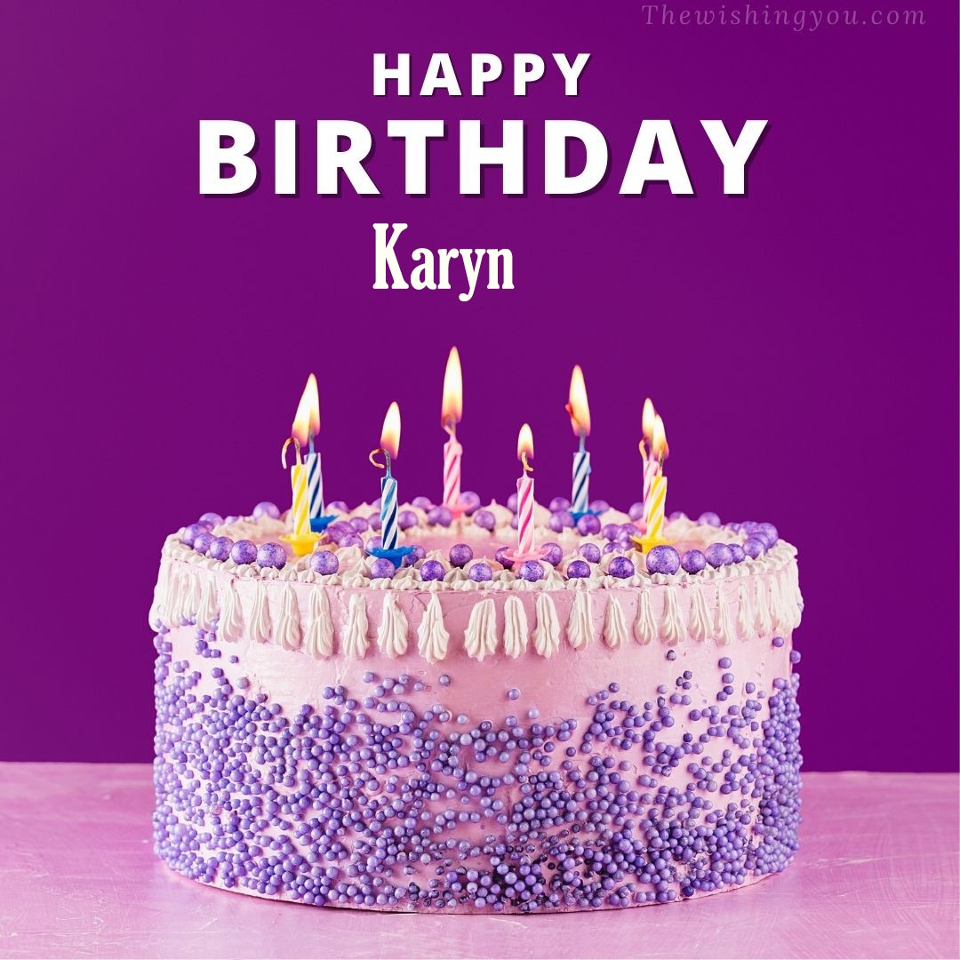 Happy birthday Karyn written on image White and blue cake and burning candles Violet background