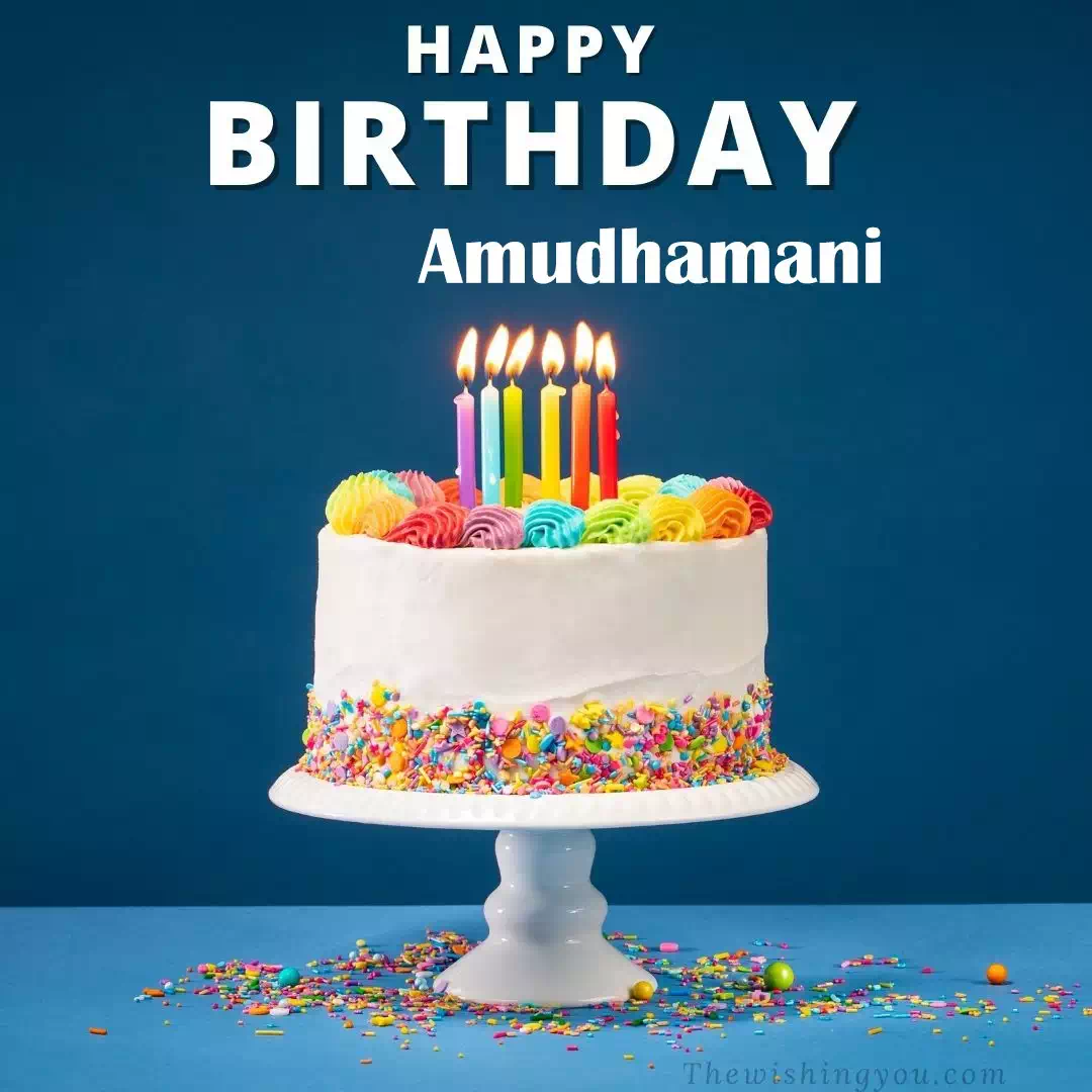 Happy Birthday Amudhamani written on image, White cake keep on White stand and burning candles Sky background