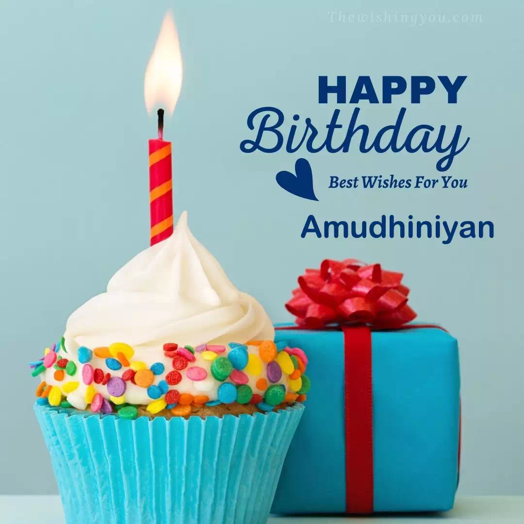 Happy Birthday Amudhiniyan written on image, Blue Cup cake and burning candle blue Gift boxes with red ribon