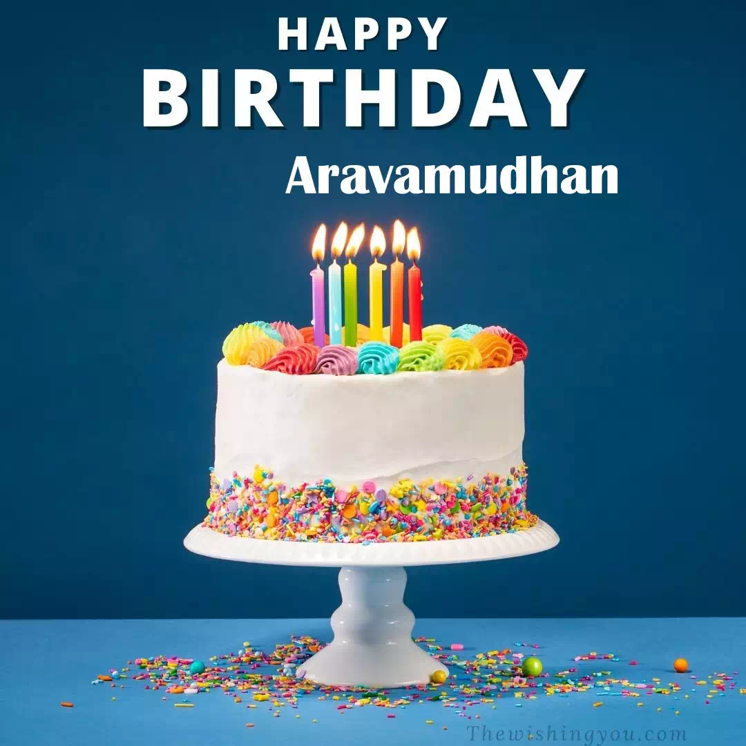 Happy Birthday Aravamudhan written on image, White cake keep on White stand and burning candles Sky background