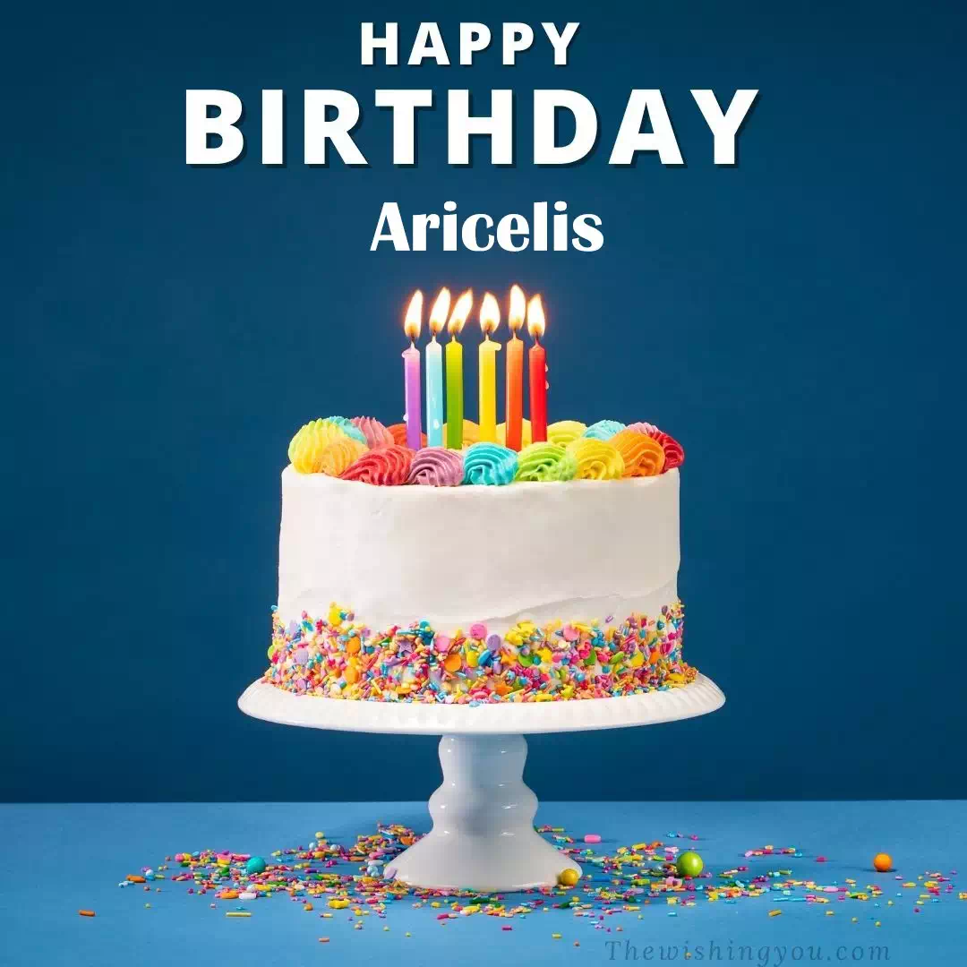 Happy Birthday Aricelis written on image, White cake keep on White stand and burning candles Sky background